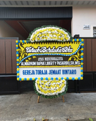 Papan Bunga Duka di Selebar